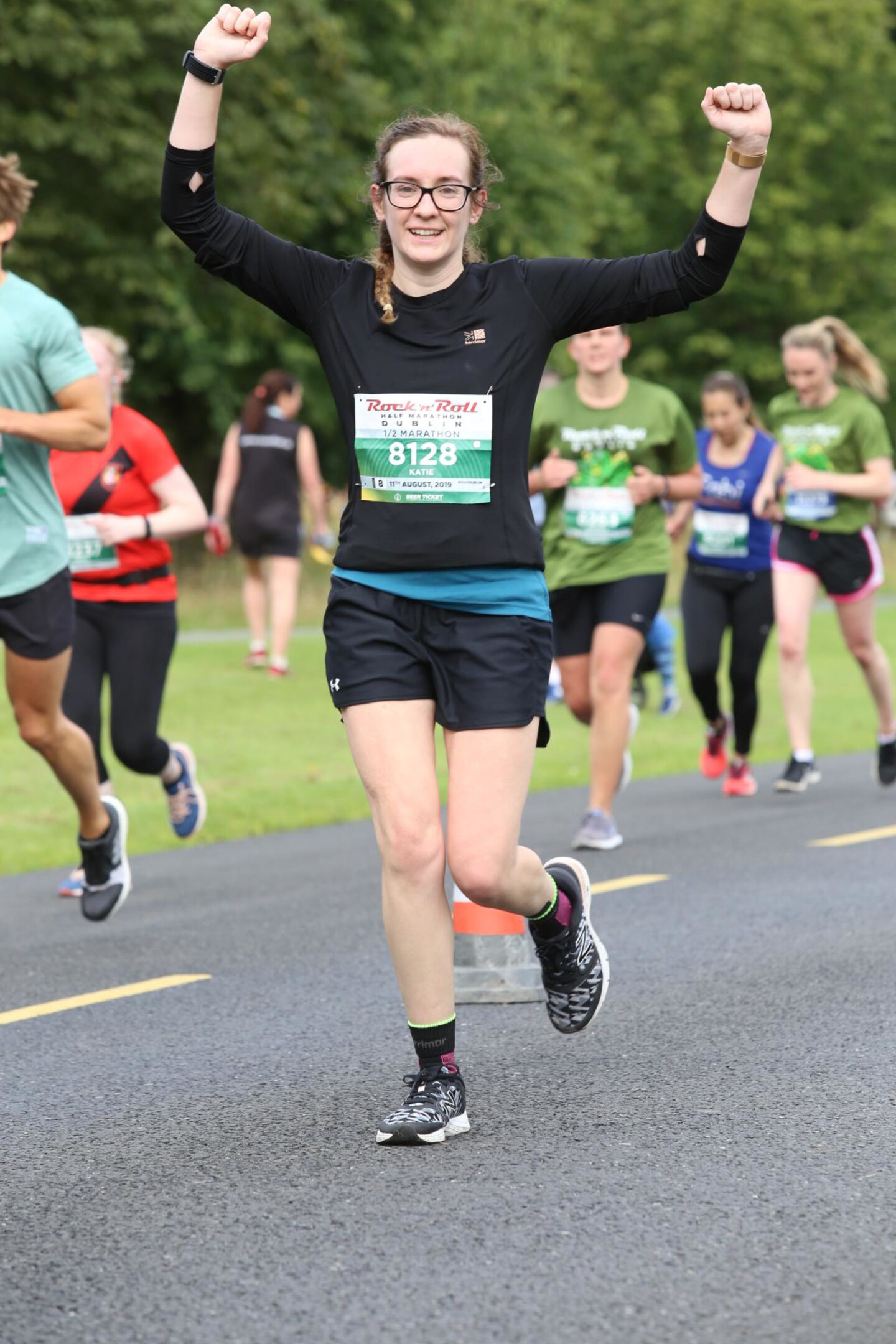 Girl celebrating mid-run