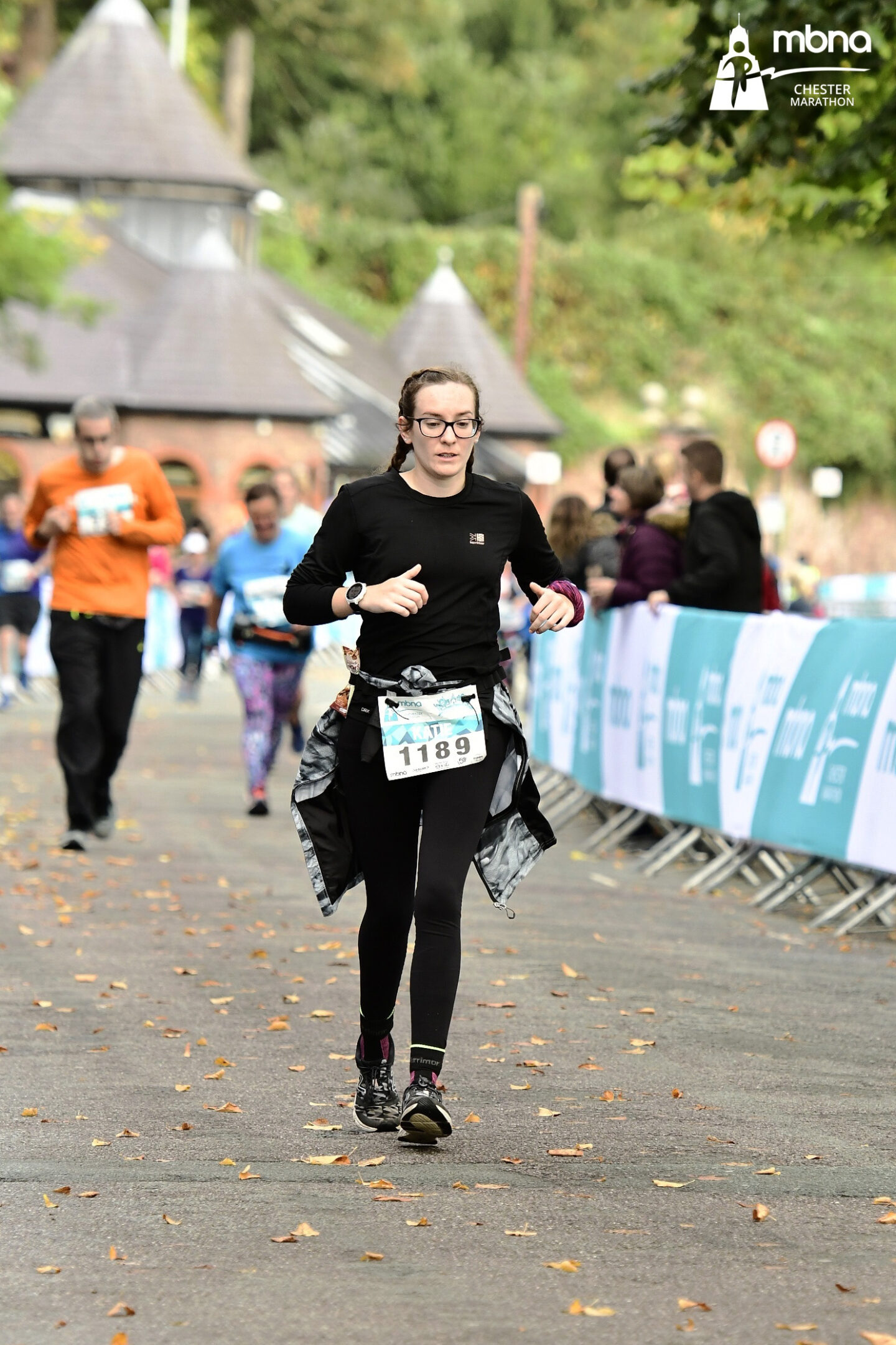 Girl running to the finish line of Chester Marathon