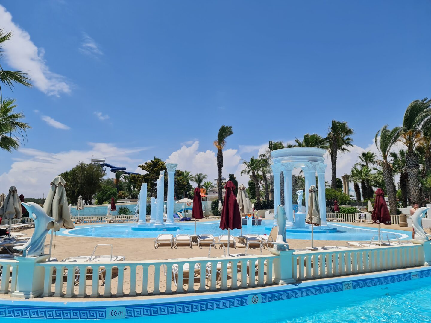 Delphin childrens pool with greek columns