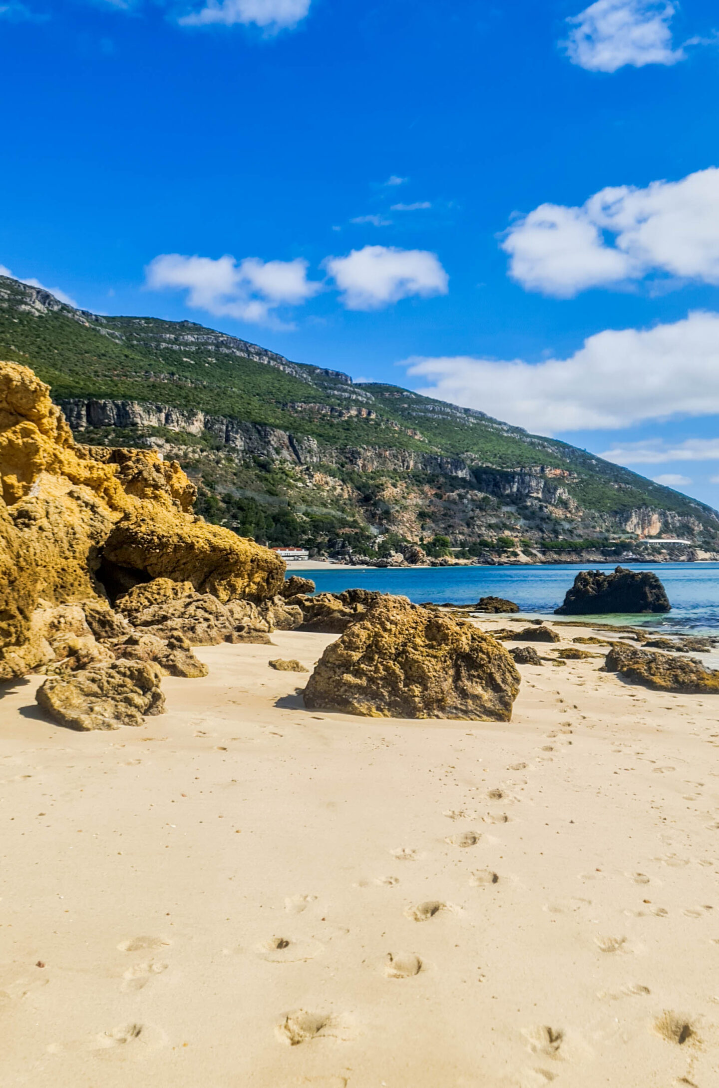 Beach view with hills in the background